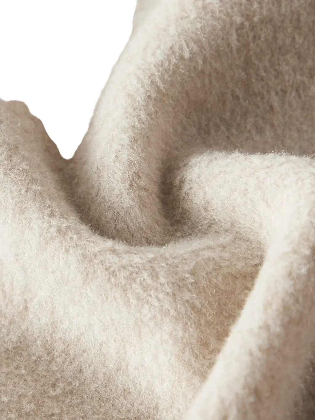 Soft cream-colored cashmere scarf with plush textured weave paired with beige wool fur cuff belted coat