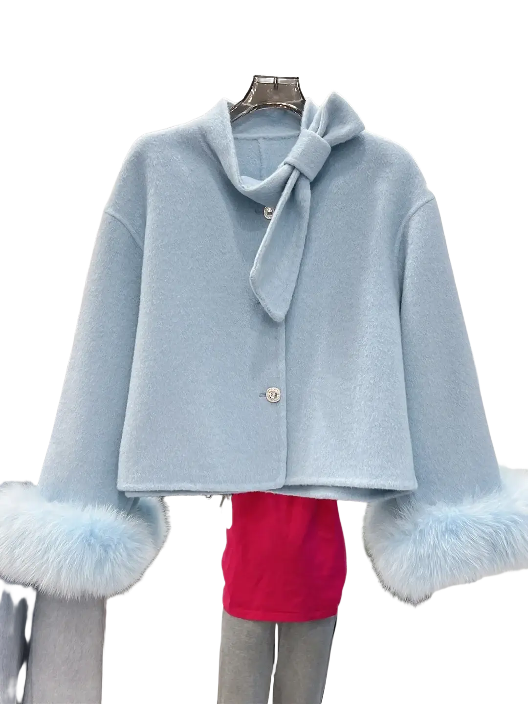 Light blue wool cropped coat with fluffy fur cuffs and matching bow at the neckline