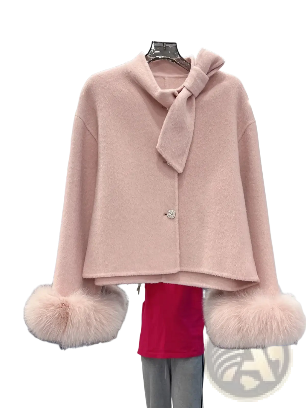 A soft pink woolen cropped coat with a bow neckline and fluffy fur cuffs wool fur cuff bow cropped coat