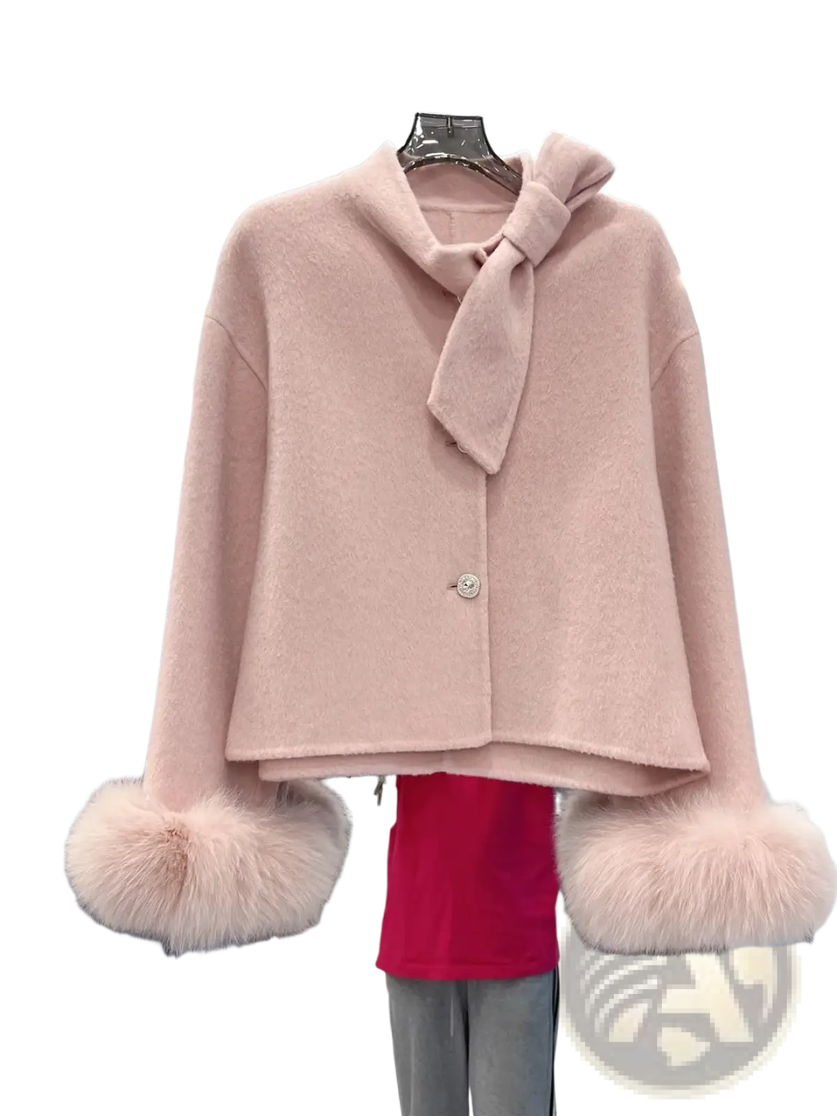 A soft pink woolen cropped coat with a bow neckline and fluffy fur cuffs wool fur cuff bow cropped coat