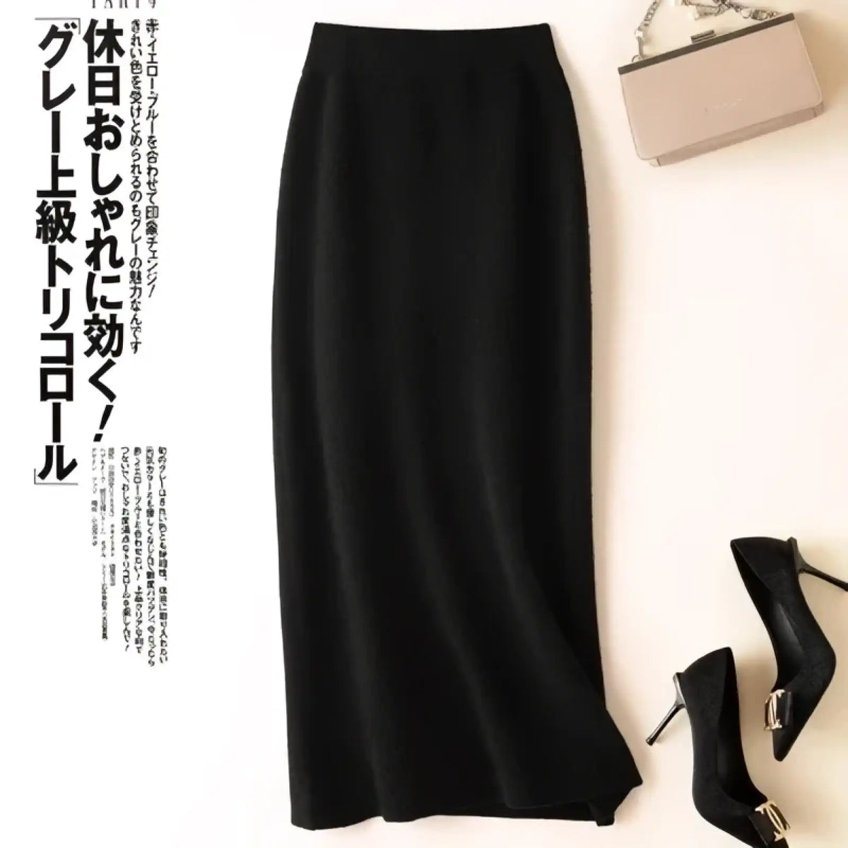 Black wool knit midi skirt with high waisted, sleek, form-fitting pencil silhouette for elegant wear