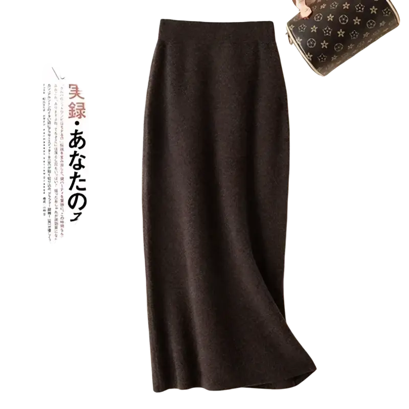 A sleek dark charcoal wool knit midi skirt with a high waisted pencil silhouette and smooth textured fabric draping elegantly