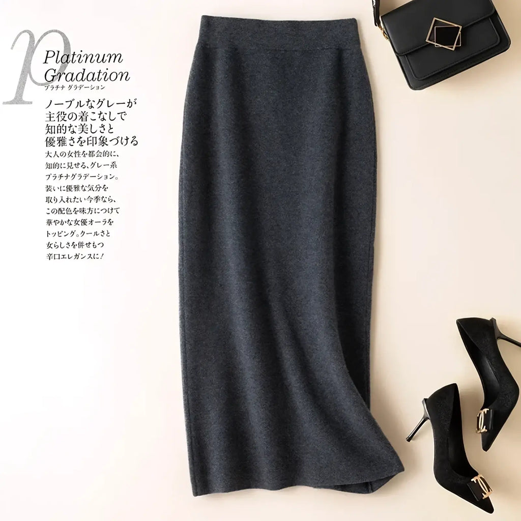 A sleek dark gray wool knit high waisted midi pencil skirt with smooth tailored fabric and subtle texture
