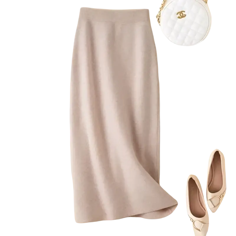 A soft beige high waisted wool knit midi pencil skirt with smooth texture and subtle vertical pleats