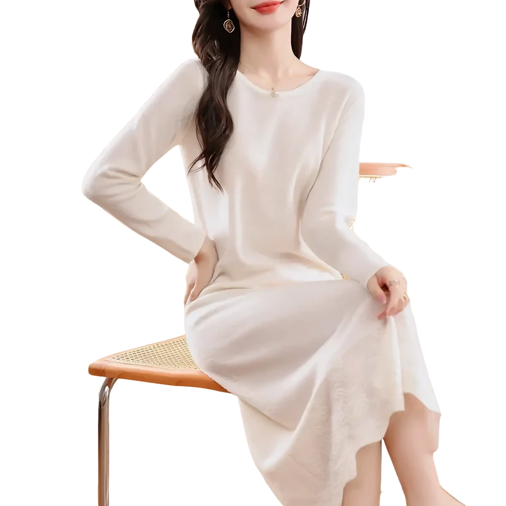 Off-white wool knit sweater dress with long sleeves round neckline and asymmetrical hemline