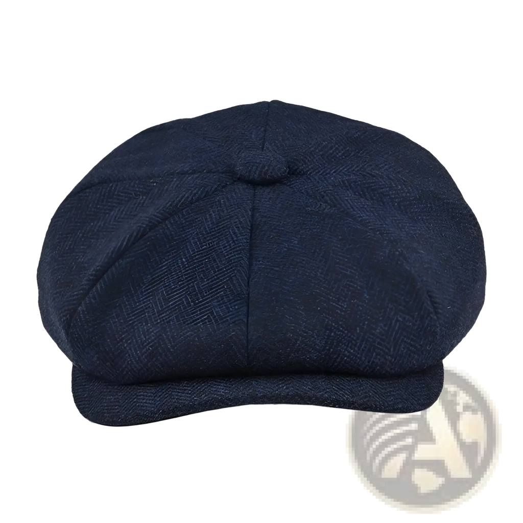 Dark blue herringbone wool newsboy hat for men with a rounded crown and stitched brim flat cap design