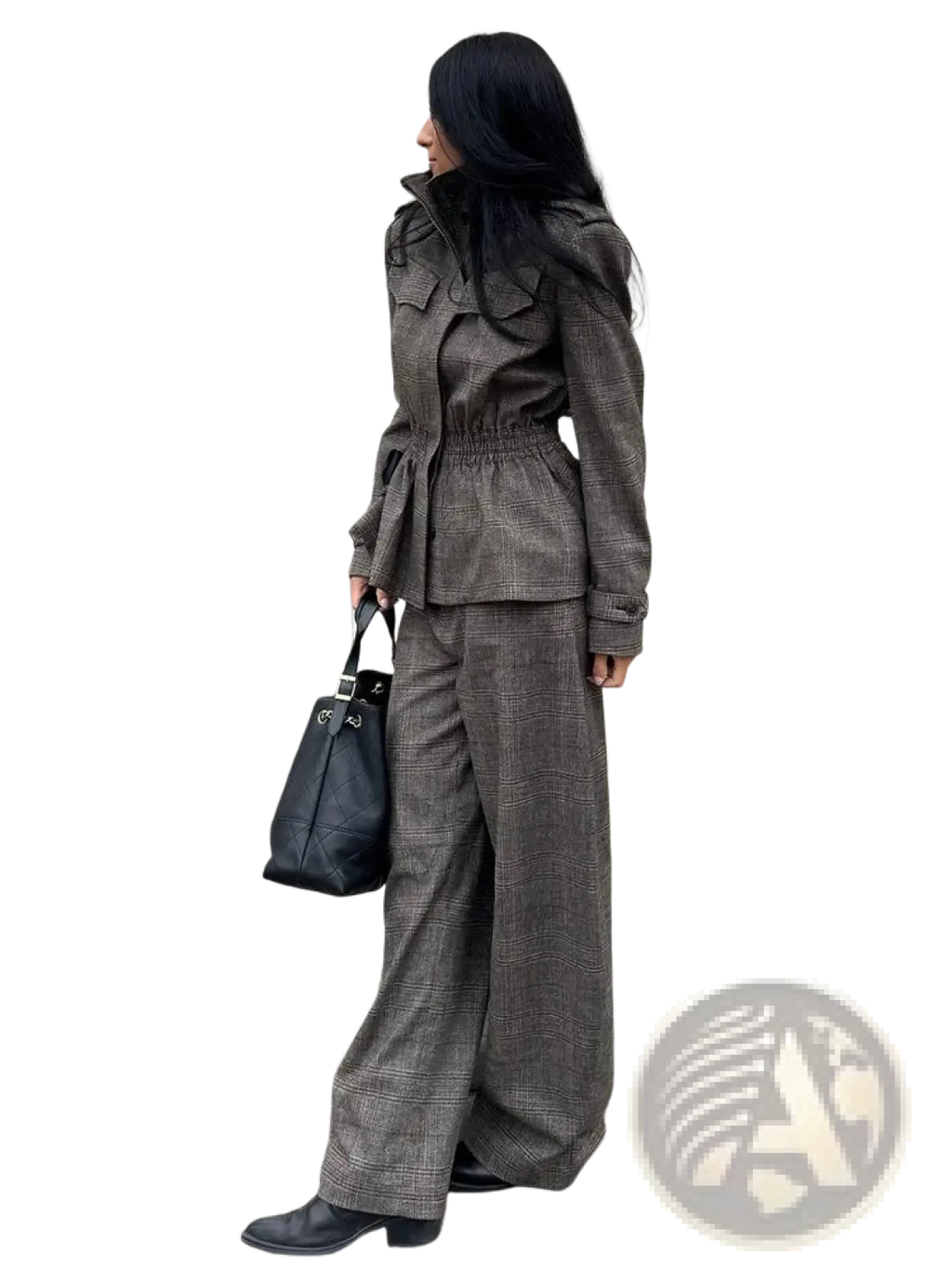 Black leather tote bag with silver hardware and white interior lining complementing wool plaid peplum blazer and trousers suit