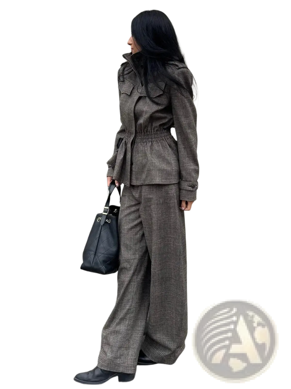 Black leather tote bag with silver hardware and white interior lining complementing wool plaid peplum blazer and trousers suit