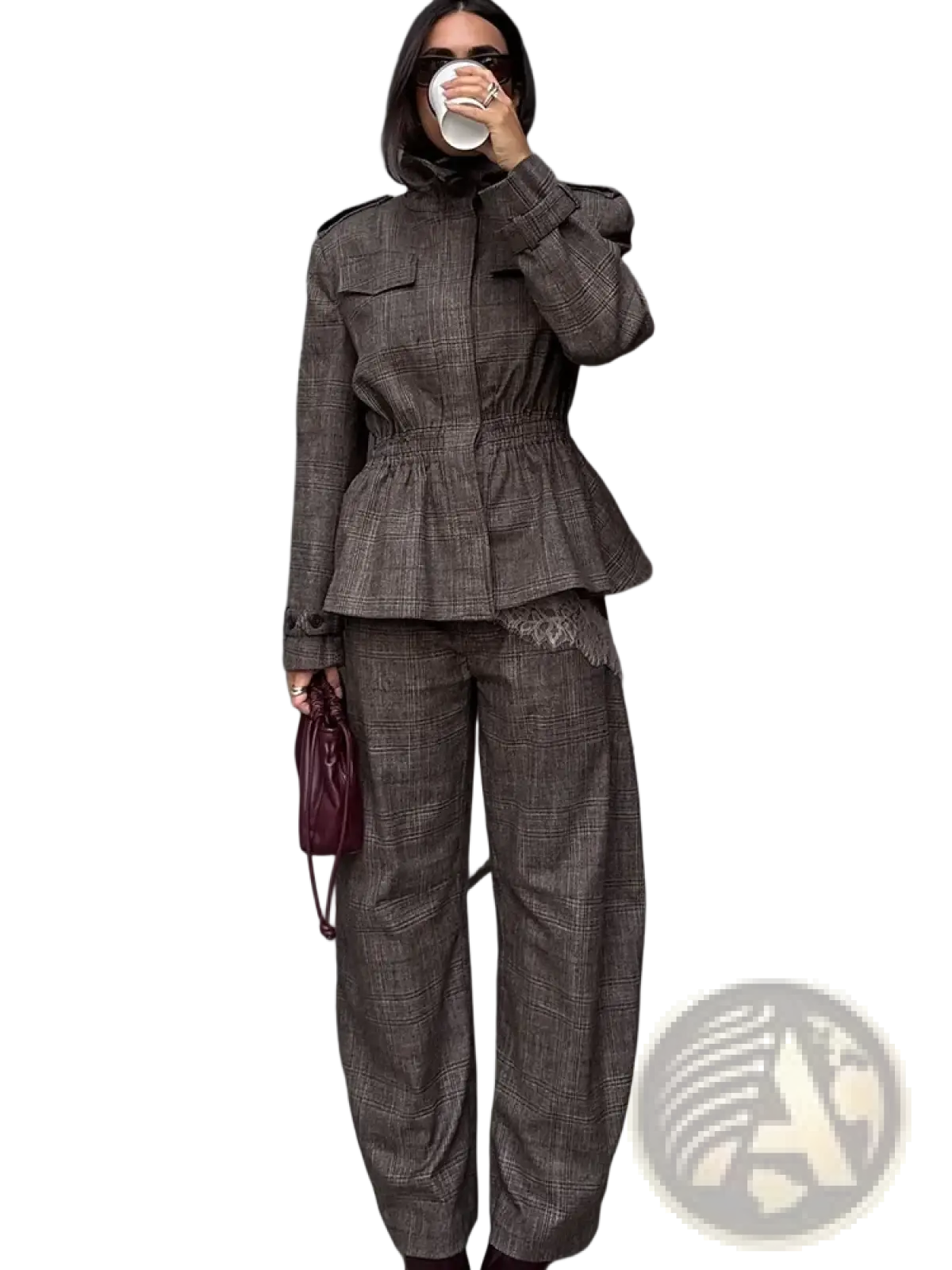 A burgundy leather mini crossbody bag with a structured slouchy design and top handle paired with a wool plaid peplum blazer and trousers suit