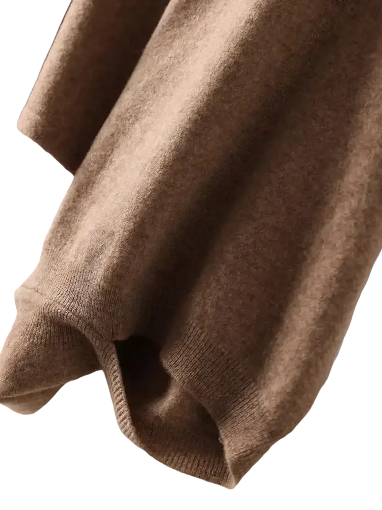 A soft camel-colored cashmere shawl wrap scarf for women with ribbed neckline and cuffs