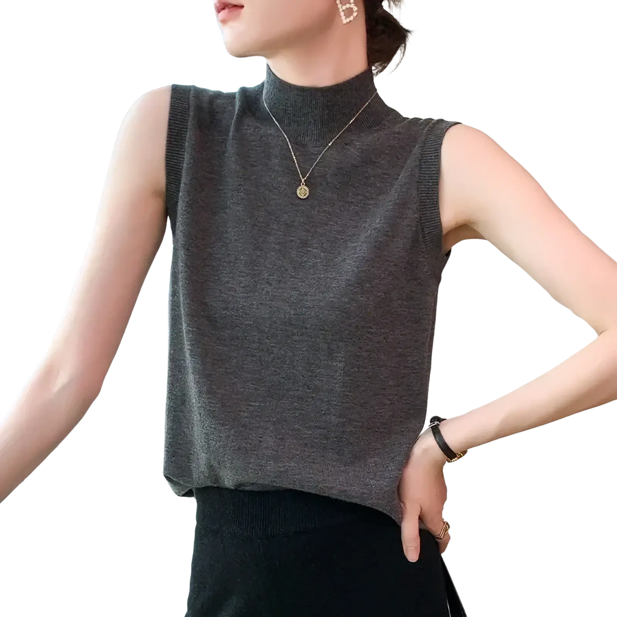 A sleek dark gray wool turtleneck sleeveless sweater vest with high neckline and ribbed trim