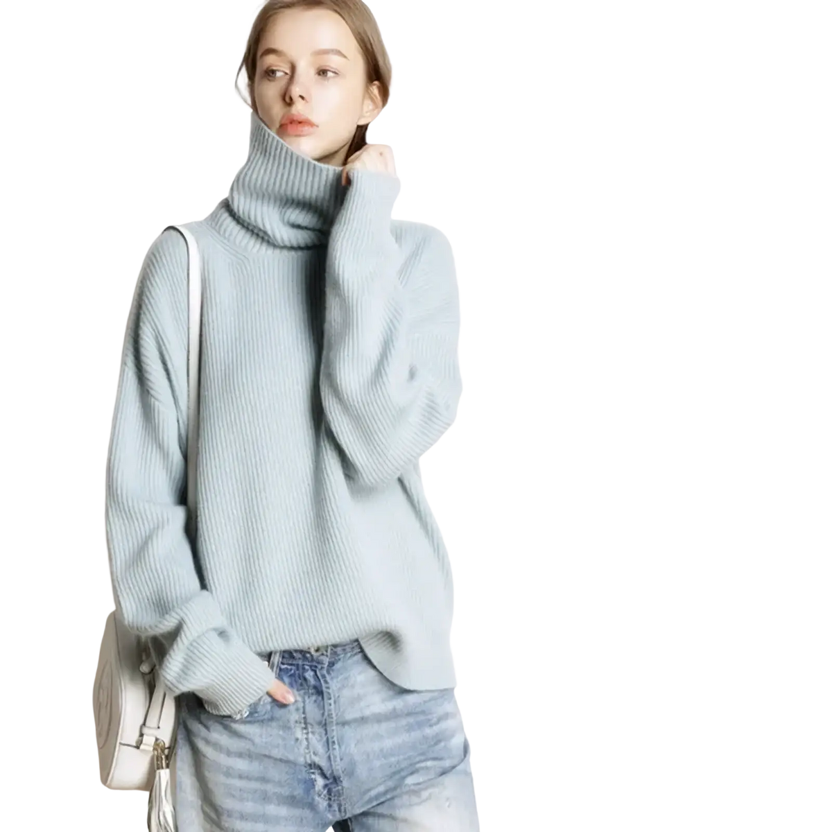 A soft light blue ribbed wool turtleneck sweater with long sleeves oversized knit pullover for cold weather