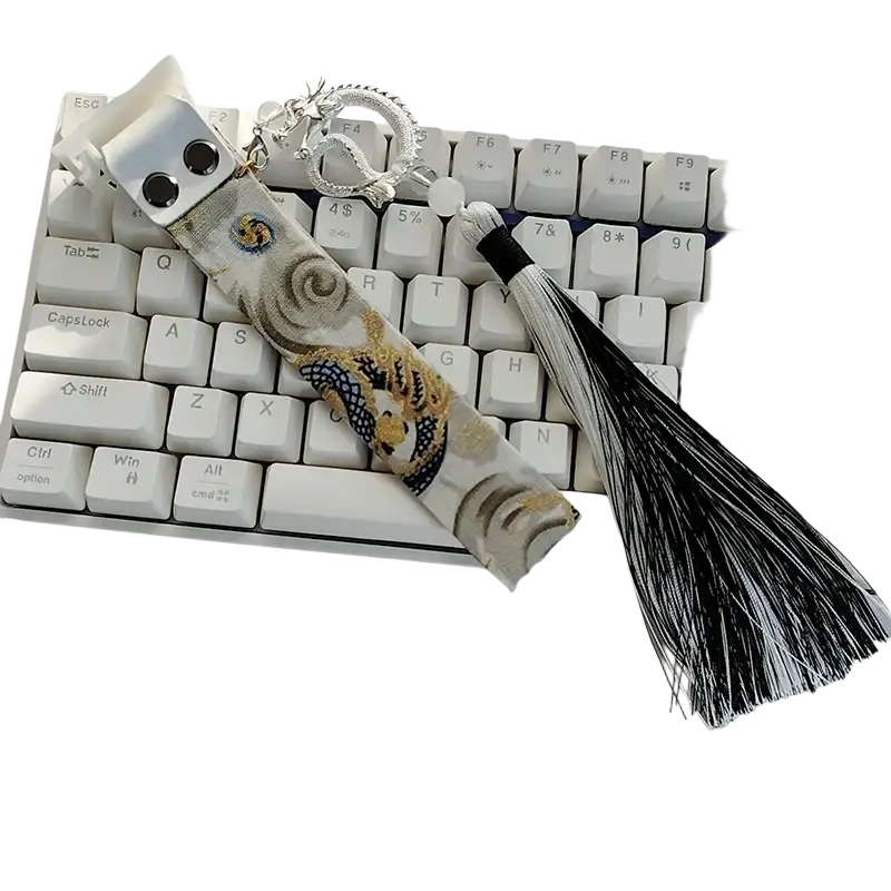 Wooting keyboard ribbon dragon design custom strap featuring a decorative dragon keychain with silver clasp and black and white tassel