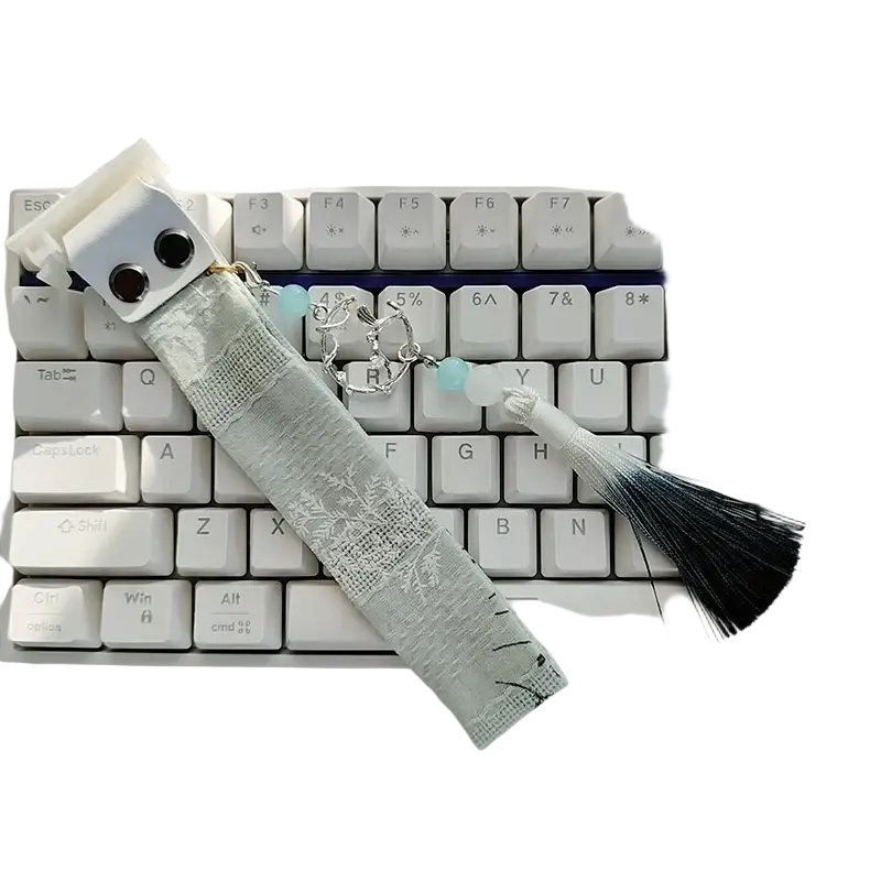 Wooting keyboard ribbon dragon design custom strap featuring a delicate light gray lace bookmark with turquoise beads and a silver chain tassel fading from white to black