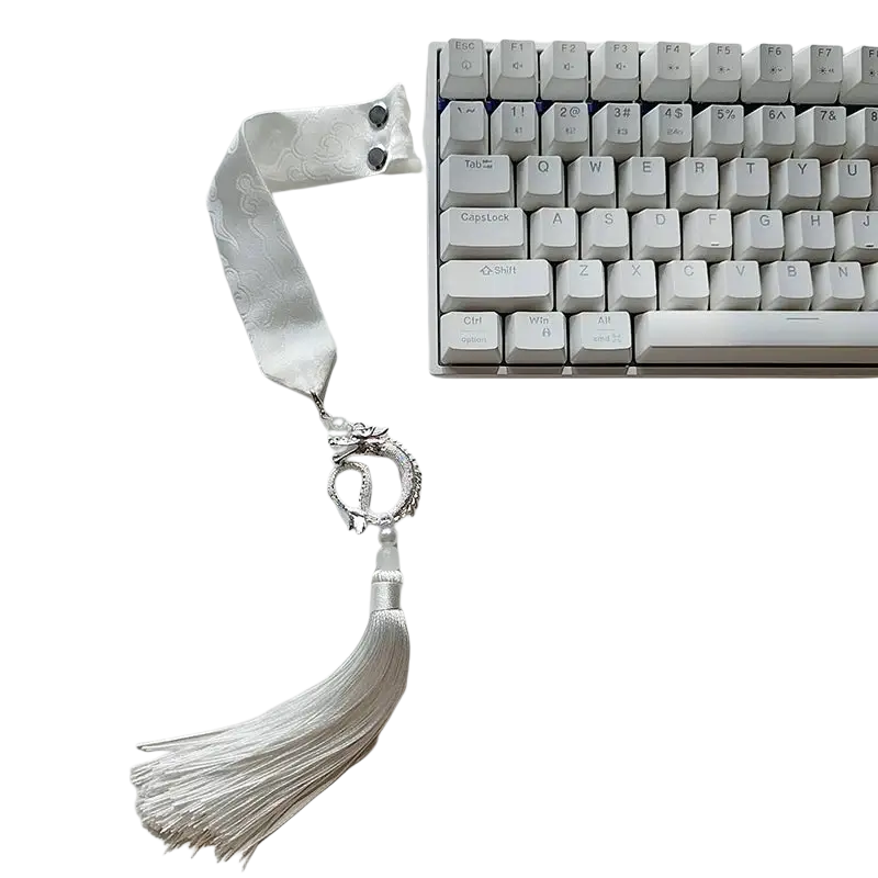 Elegant white silk ribbon with silver dragon charm and tassel attached to wooting keyboard custom strap