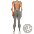 Back view of a sleek olive green one-piece athletic jumpsuit with halter neckline and open back design for workouts