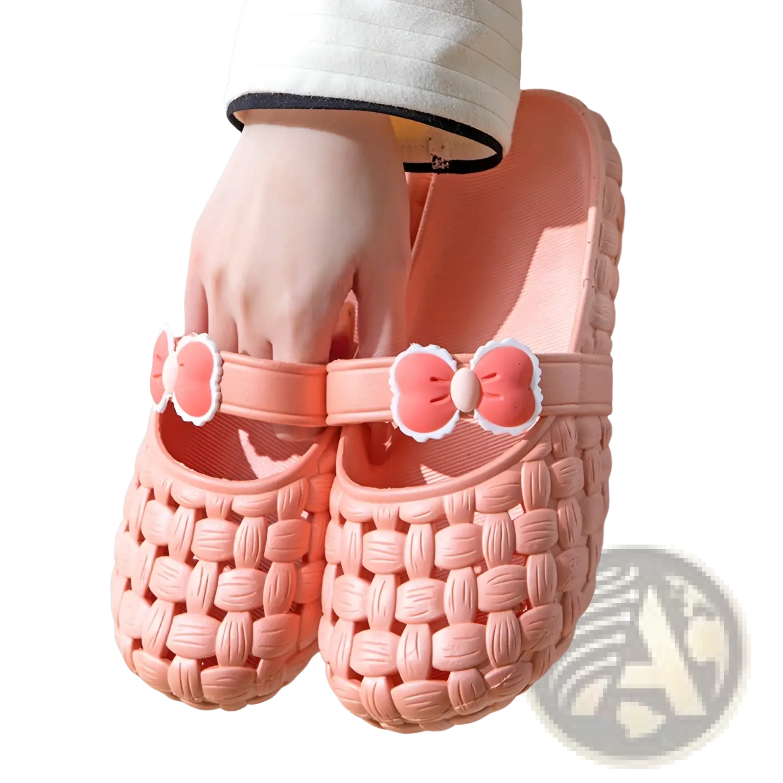 Pink woven plastic slippers with decorative bow straps designed as summer pvc beach slide sandals
