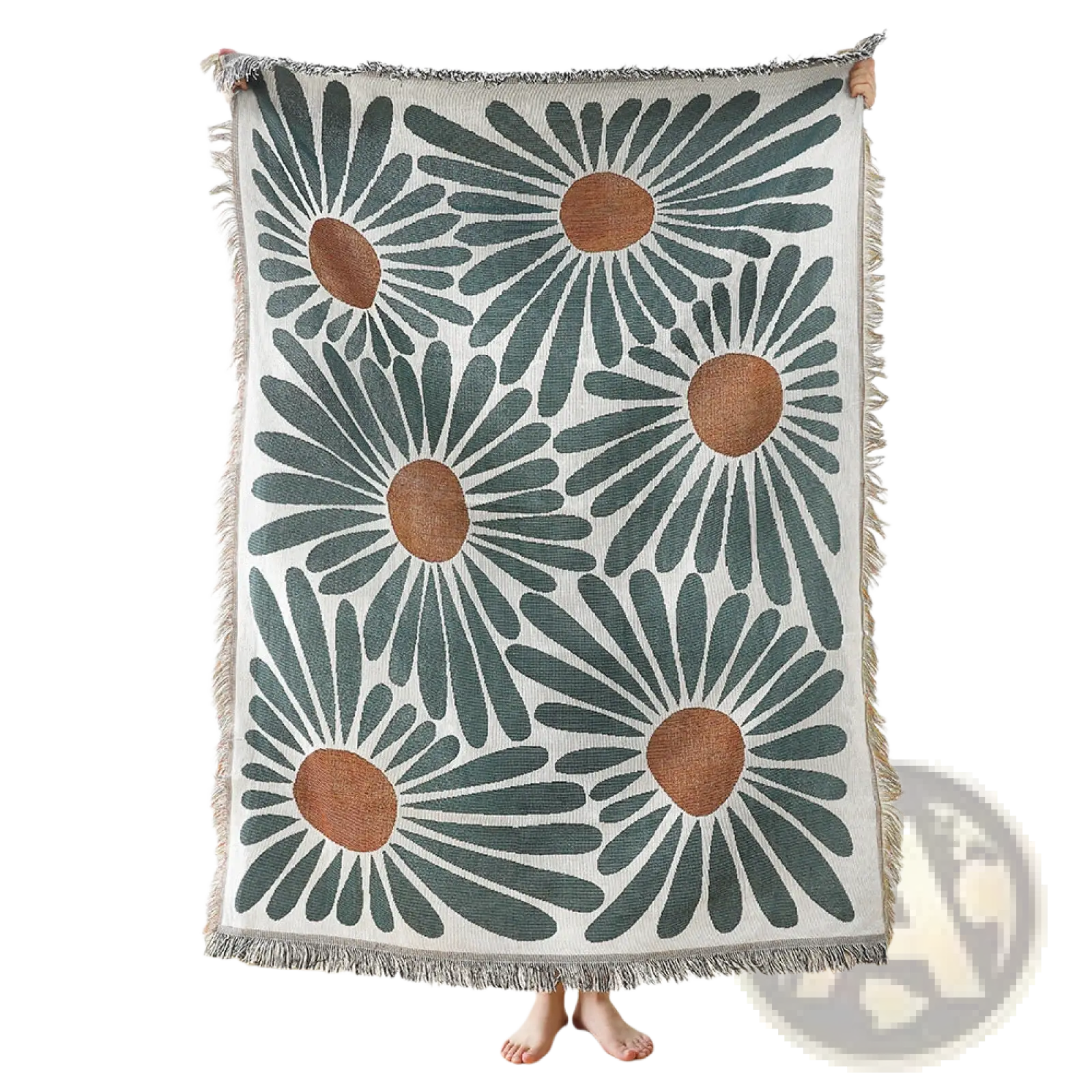A cozy cream-colored woven cotton throw blanket with bold oversized daisies and soft frayed edges
