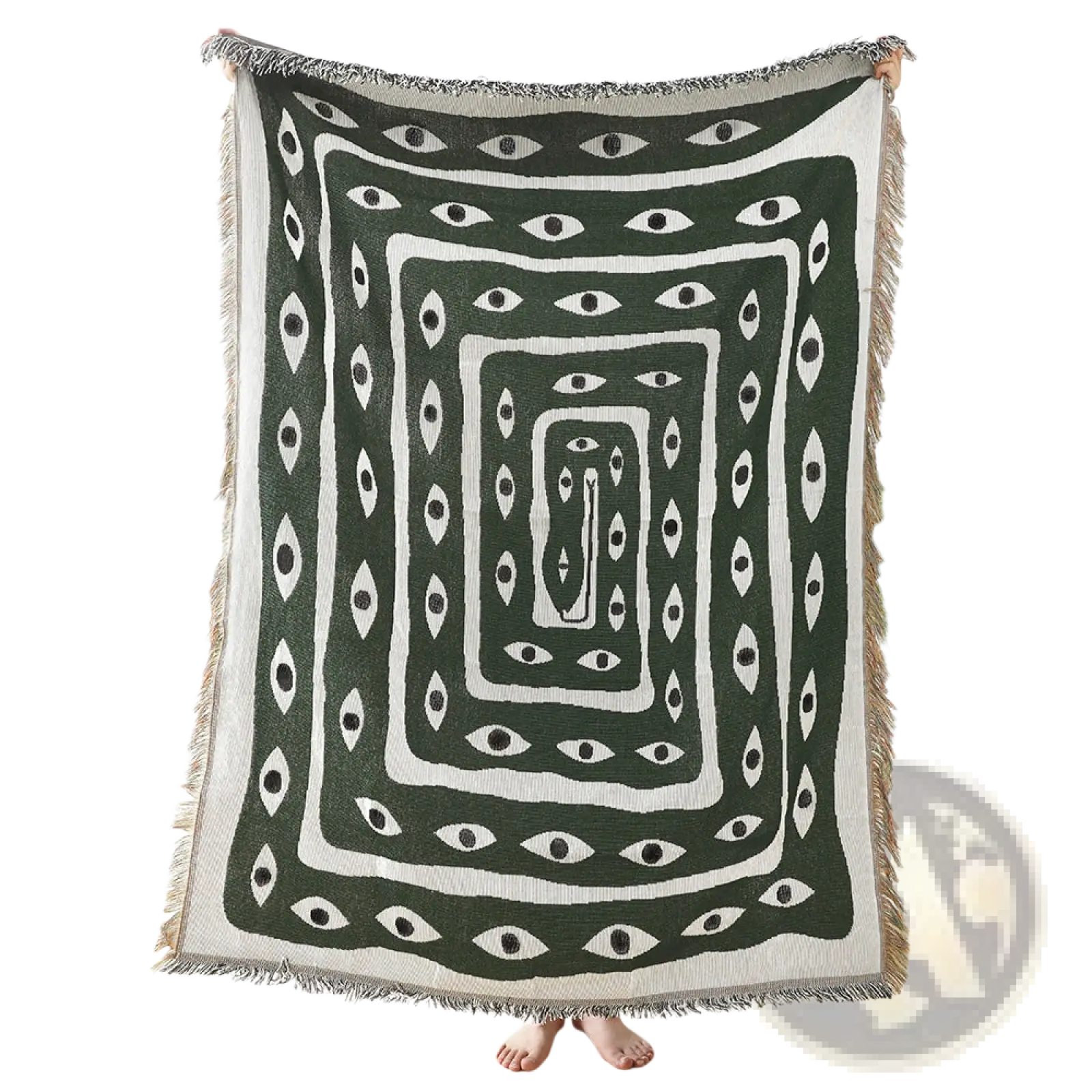 Woven cotton daisy and geometric floral throw blanket in dark green and white with stylized eye pattern and fringed edges