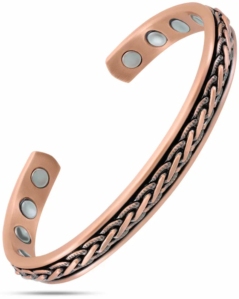 Woven copper magnetic therapy bangle bracelet in rose gold with intricate braided design and three circular magnets on each end