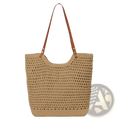 Beige woven straw tote bag with brown leather handles featuring large capacity for summer beach use