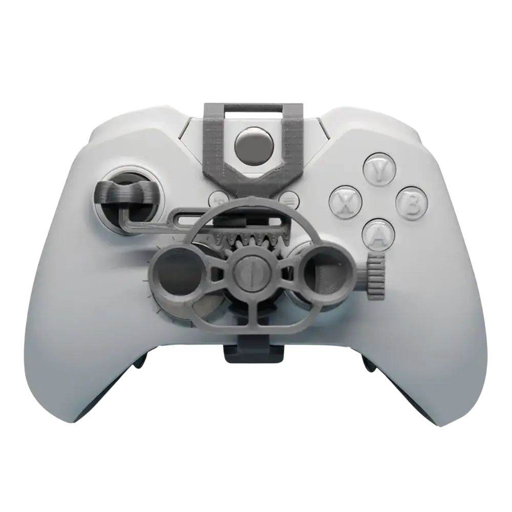 Gray mechanical gear-style attachment made of durable material mounted on white Xbox controller for mini racing use