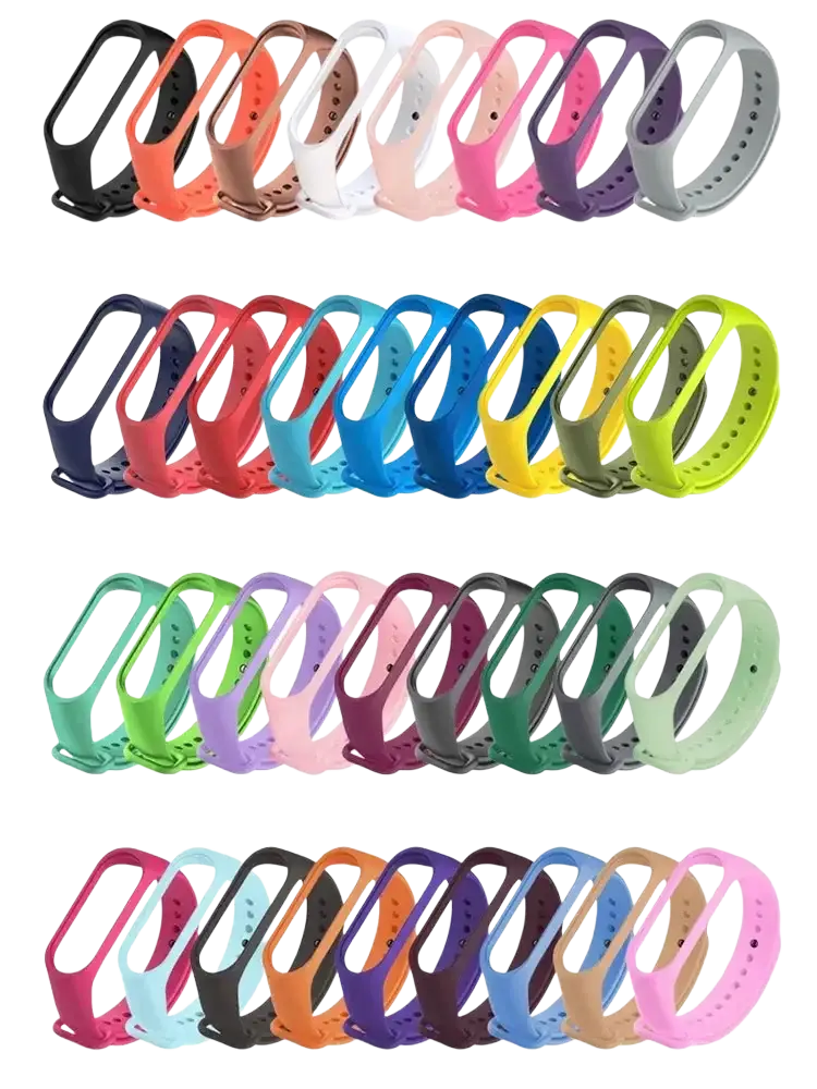 A vibrant array of xiaomi mi band wristband silicone bracelet straps in assorted colors made from durable silicone material