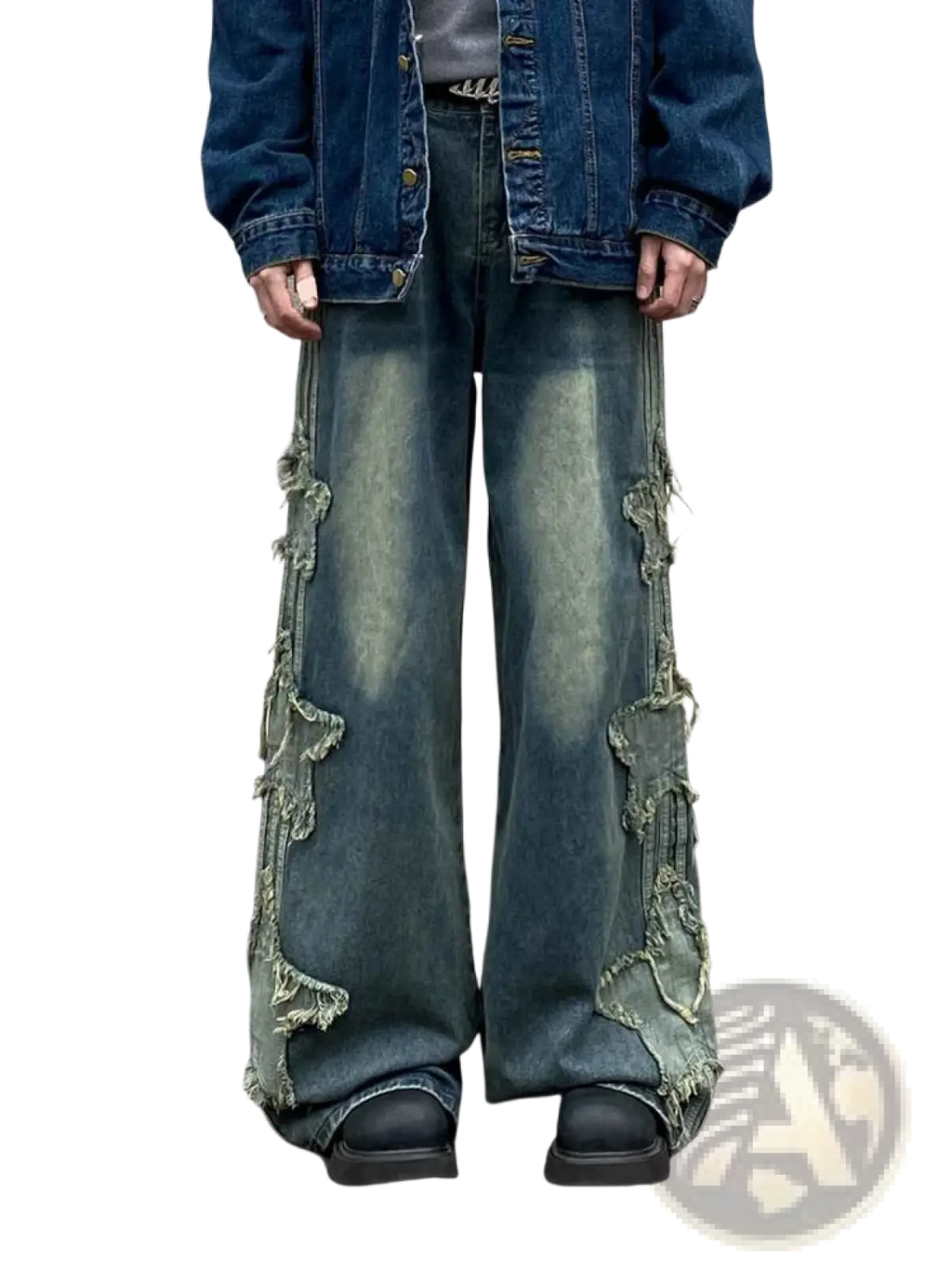 Y2k baggy distressed denim jeans in blue with frayed layered cutouts along the flared sides in denim material