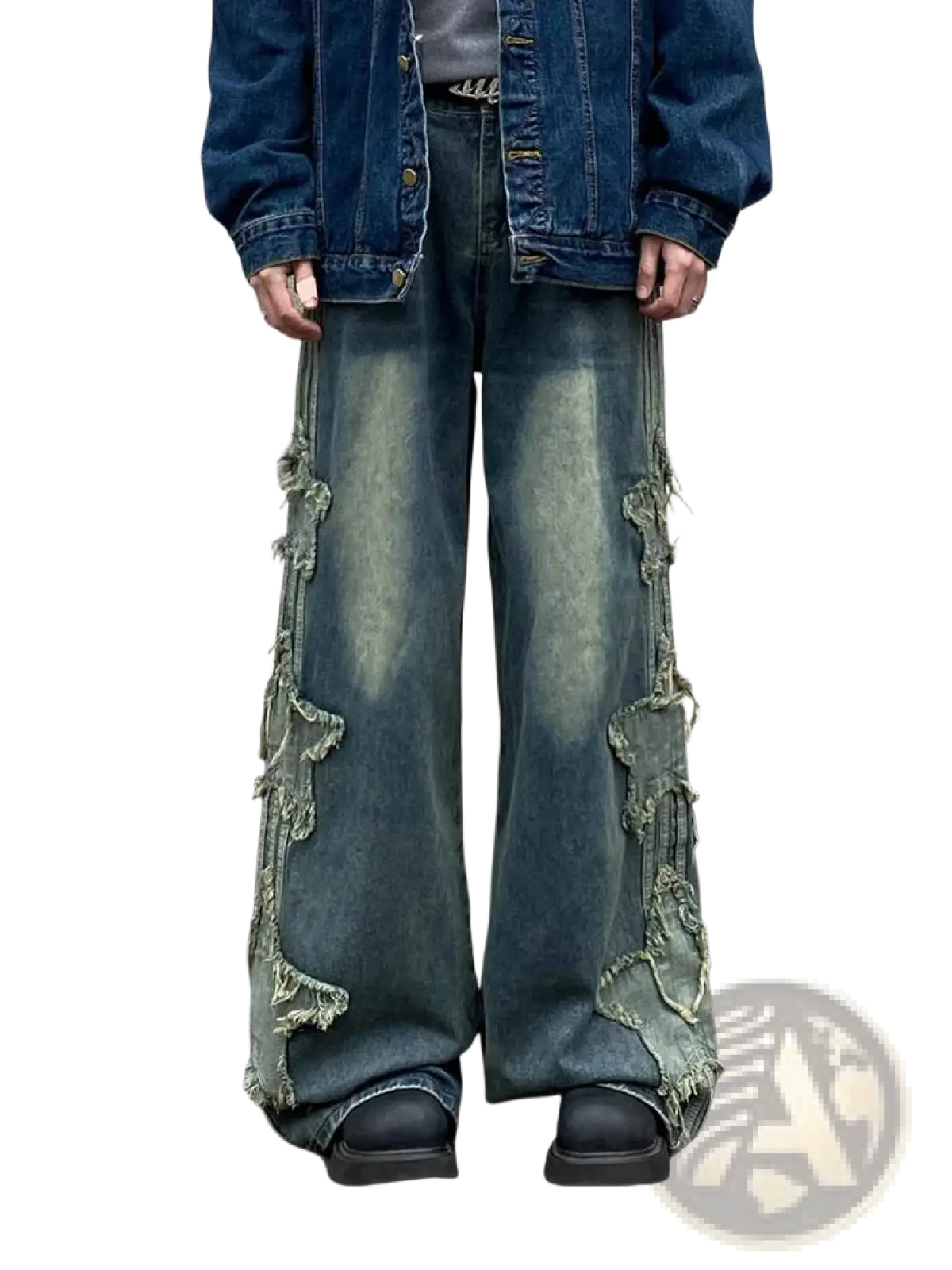 Y2k baggy distressed denim jeans in blue with frayed layered cutouts along the flared sides in denim material