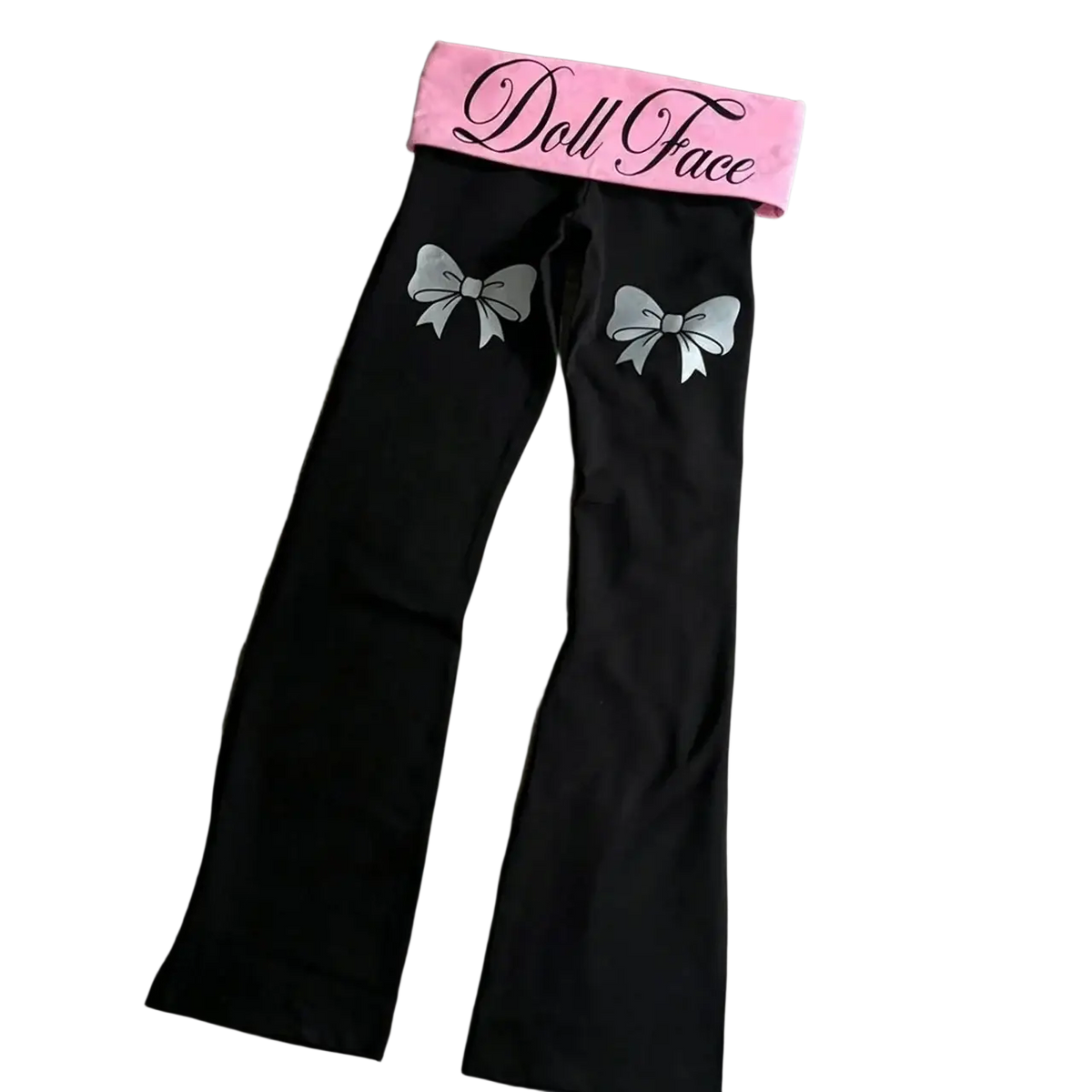Black flare leggings with pink waistband featuring doll face script and silver bow designs on the thighs