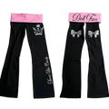 Black Y2k flare leggings with pink waistband featuring white and silver bows and gothic graphic designs