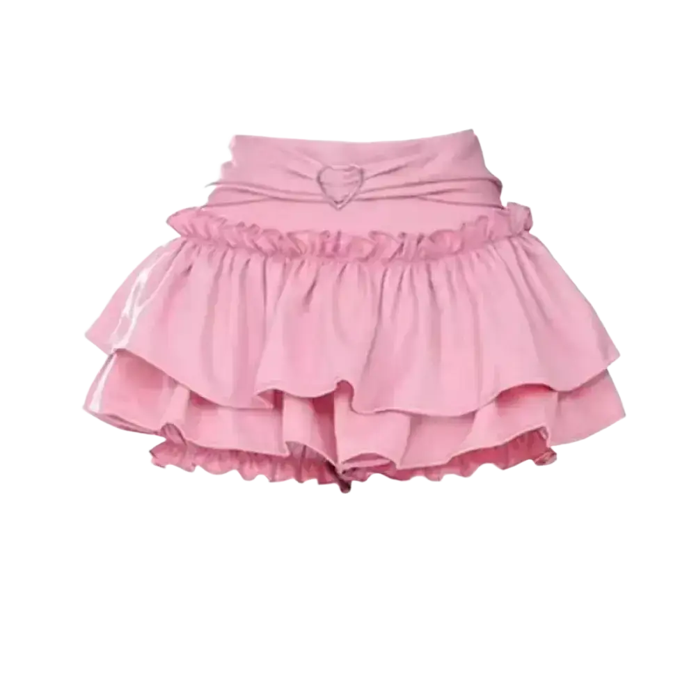 A soft pink y2k high waist mini skirt with tiered ruffles, gathered waistband, and subtle heart-shaped embellishment