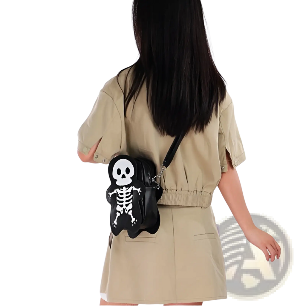 Black skeleton-shaped crossbody shoulder bag with white skull and bone design in y2k style for casual use