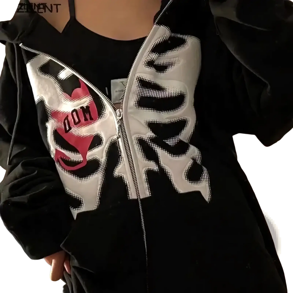 Black oversized Y2k skeleton zip up hoodie featuring a bold white and pink butterfly graphic on the front