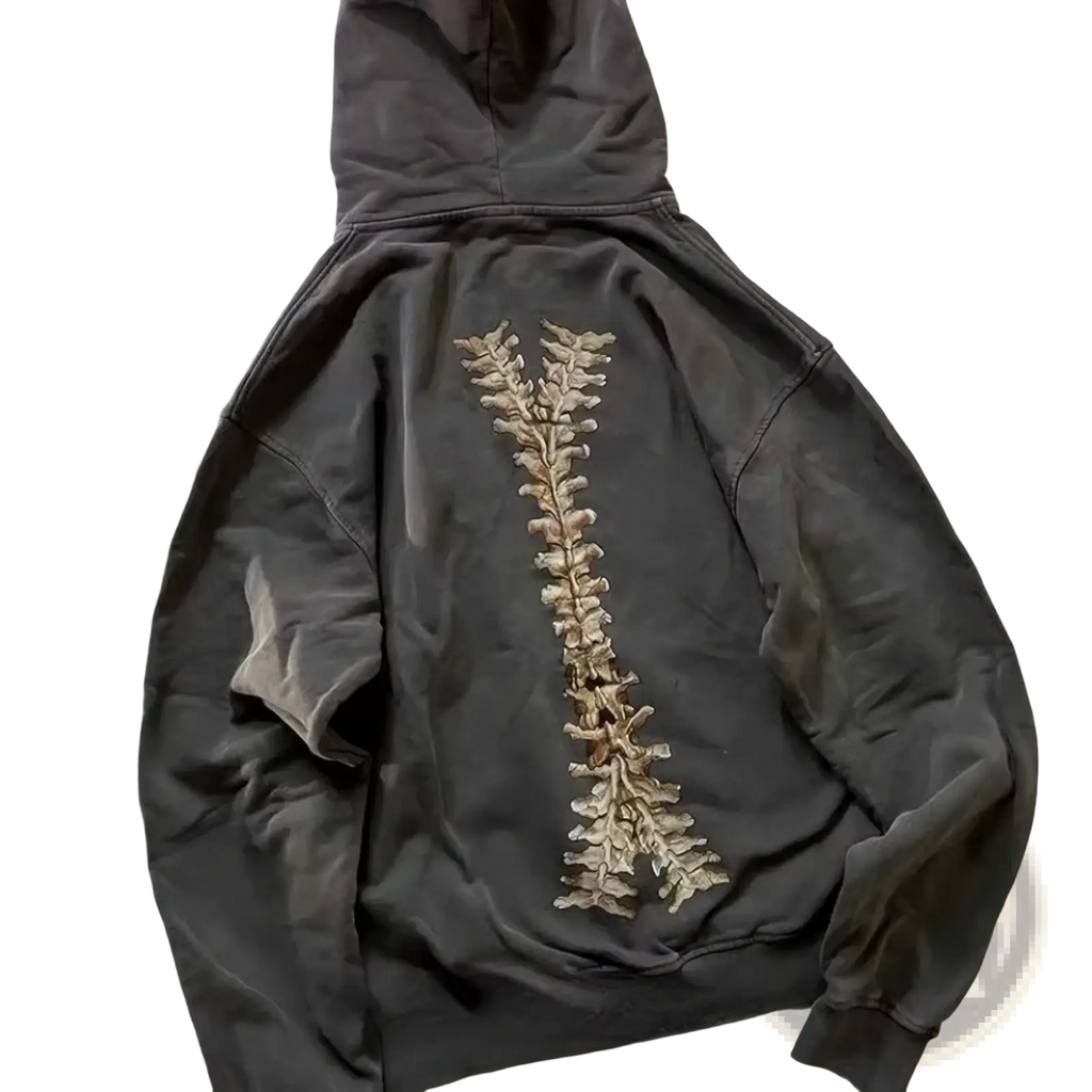 Dark gray oversized streetwear zip up hoodie with beige embroidered spine design on the back for y2k skeleton style