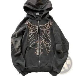 Dark gray oversized zip up hoodie featuring a detailed faded skeleton ribcage graphic for y2k streetwear style