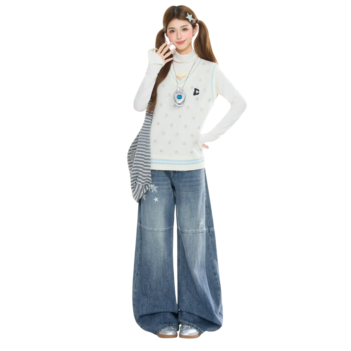 White knit vest with light blue trim and subtle gray star embroidery styled with y2k star embroidered wide leg denim jeans