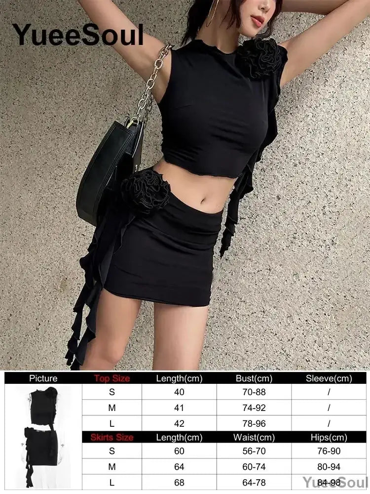 Black ruffled crop top with floral embellishments and asymmetrical hemline featuring tie closure type in y2k set