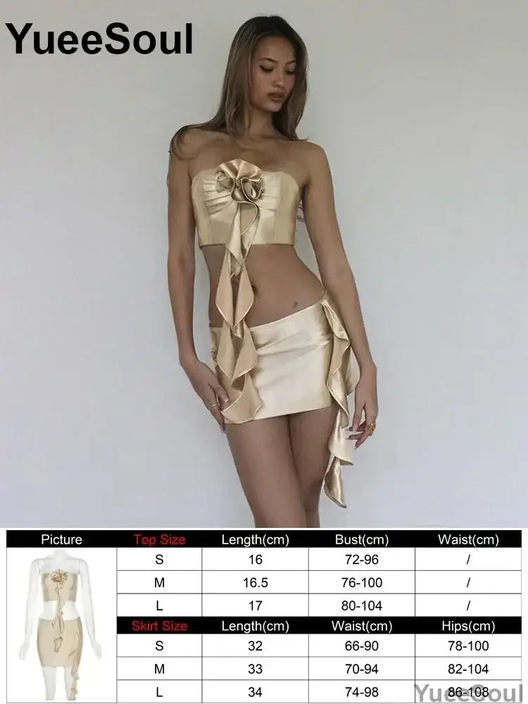 Gold satin strapless crop top with large ruffled bow front closure type in Y2k two piece halter top and pleated mini skirt set