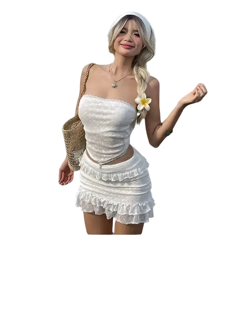 White lace two piece summer outfit with ruffled skirt and strapless top featuring halter closure type