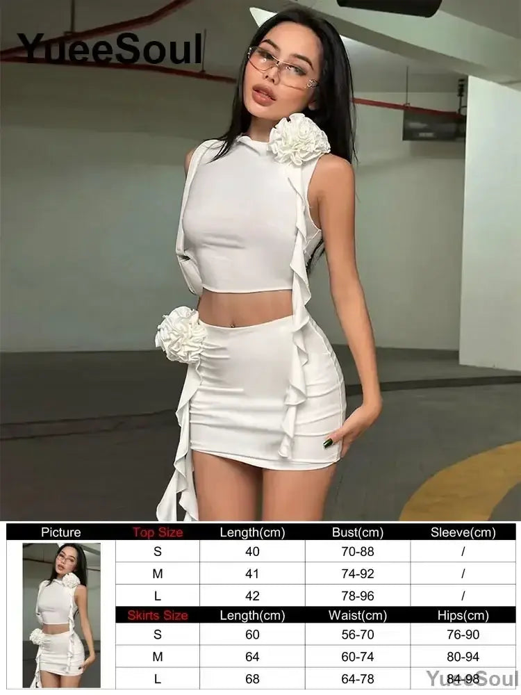 White ruffled two-piece halter top and pleated mini skirt set from yueesoul with floral embellishments and tie closure type