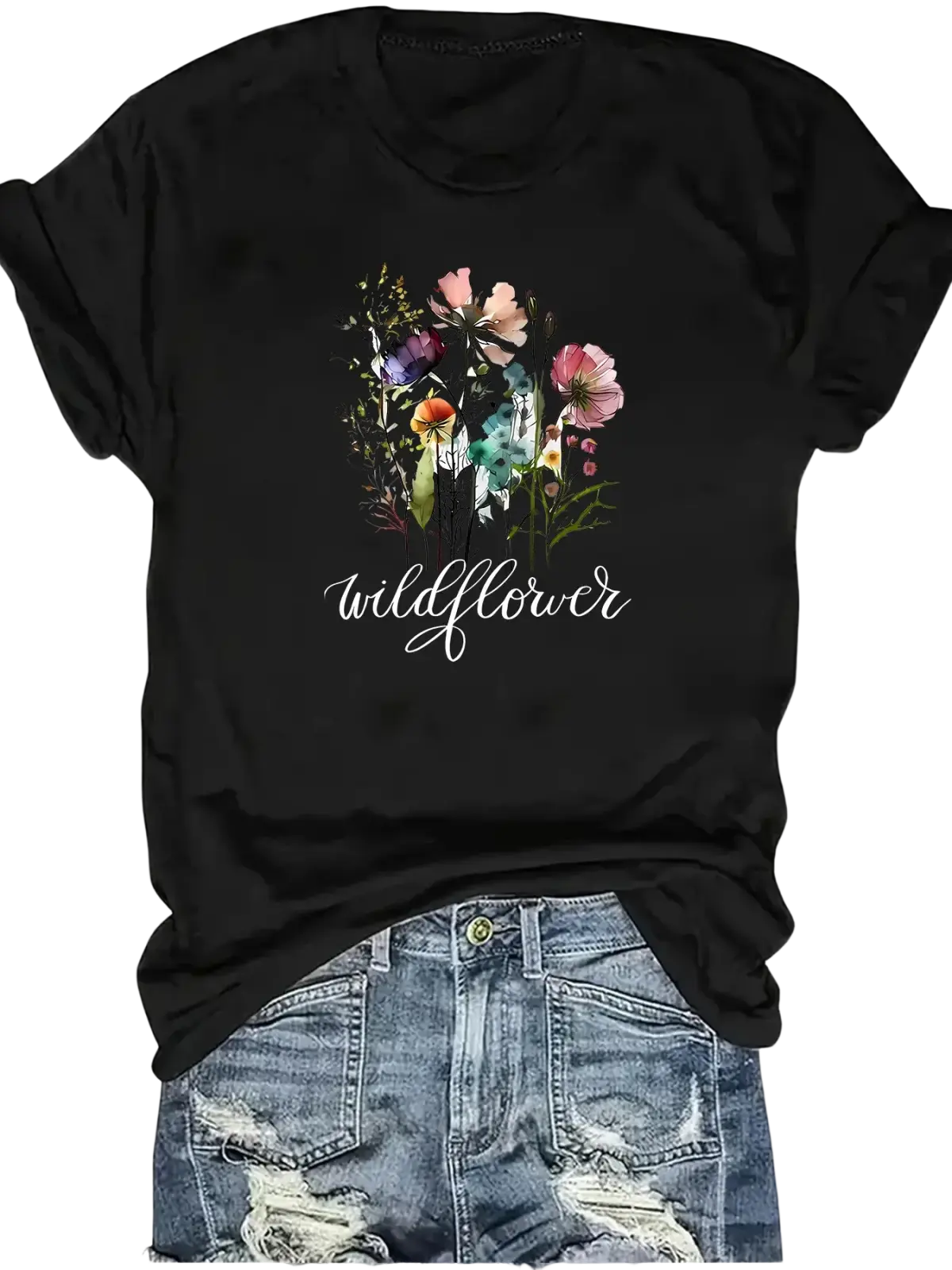Black y2k short sleeve t-shirt with colorful watercolor wildflower design and white cursive wildflower text below