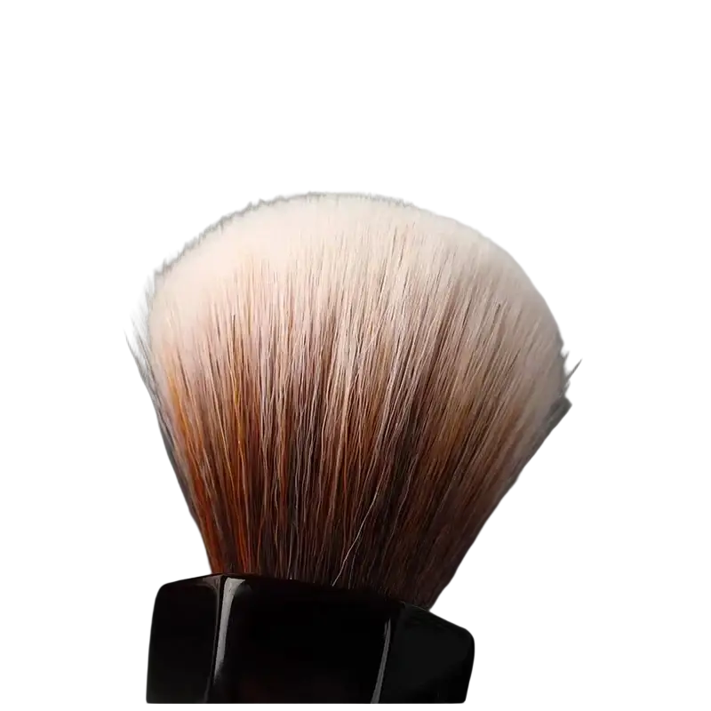 A sleek black-handled yaqI 24mm synthetic hair shaving brush with gradient beige to warm brown bristles
