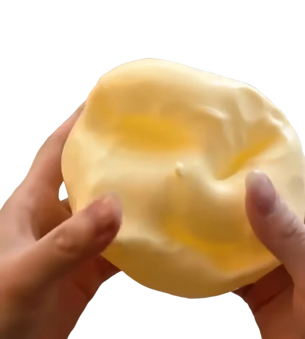 Yellow cheese squishy stress relief toy featuring a soft pale yellow vaseline-themed smooth and slightly glossy surface
