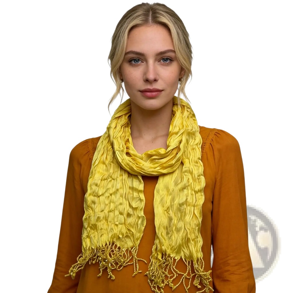 A vibrant yellow crinkle scarf textured summer silk accessory with fringed edges worn around the neck