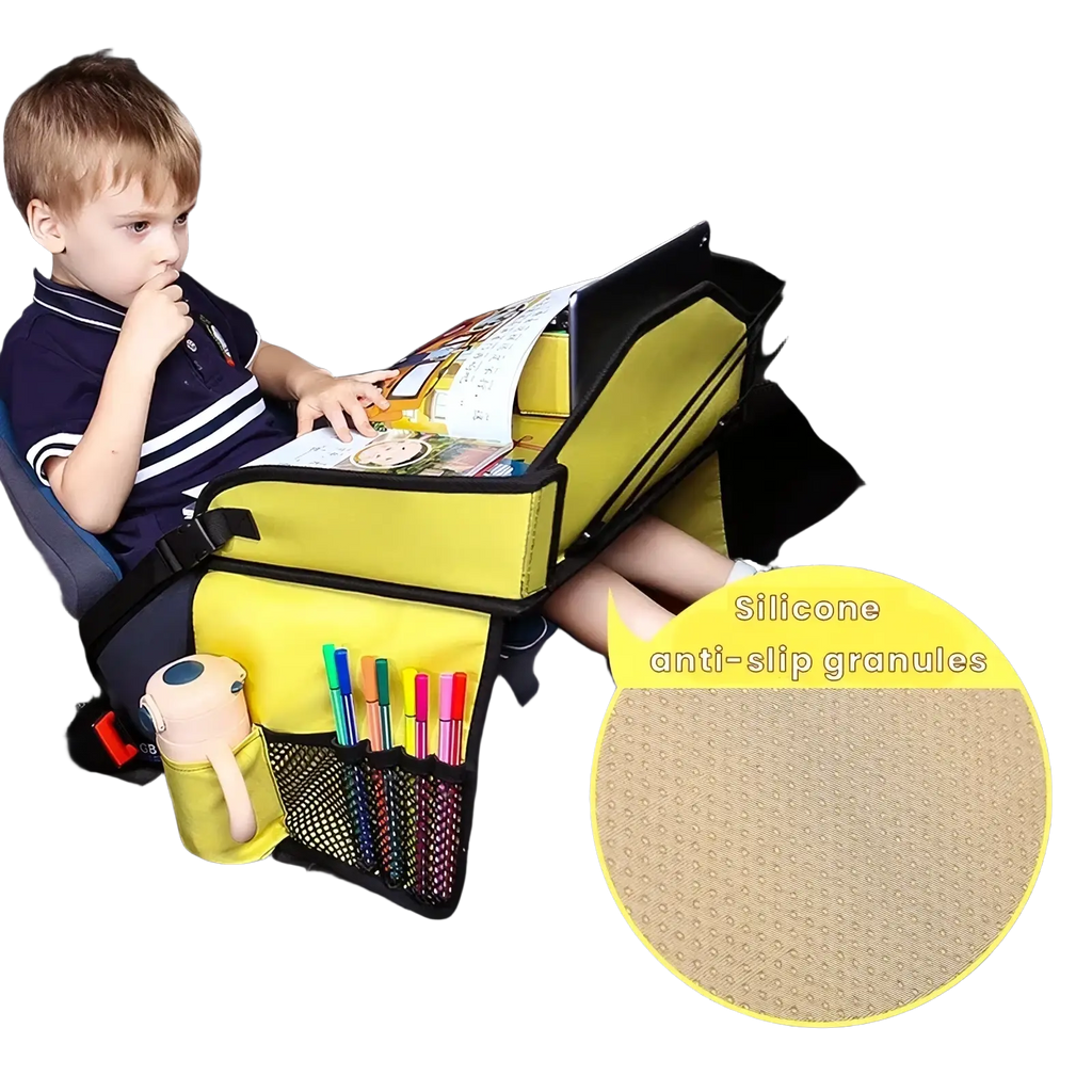 Yellow kids car seat travel tray and organizer with black trim and silicone anti-slip granules visible from the back side
