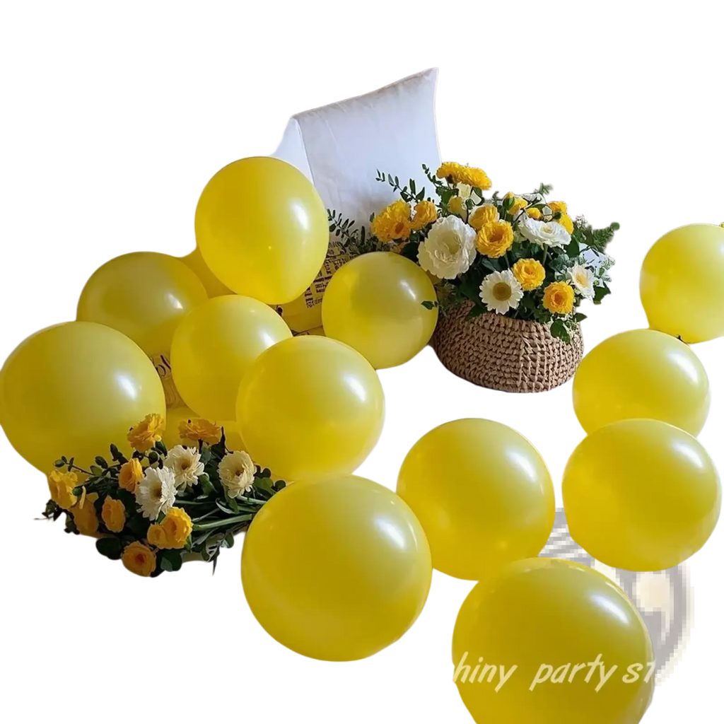 Bright yellow latex balloons scattered on a bed for yellow latex balloons party arch decor use