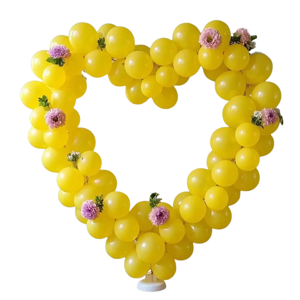 A vibrant yellow latex balloon heart arch decorated with pink and purple flowers for party decor