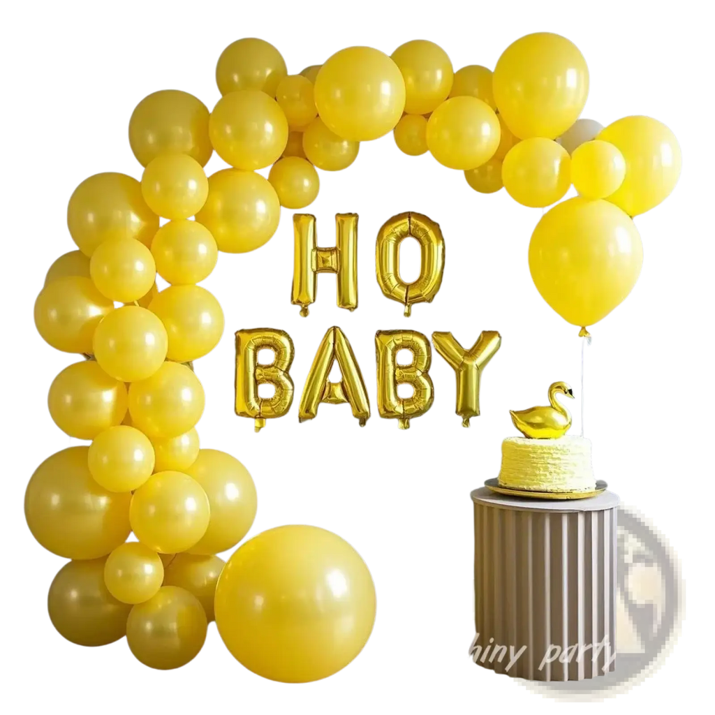 Yellow latex balloons party arch decor featuring a vibrant balloon arch with gold foil ho baby lettering and golden swan cake topper
