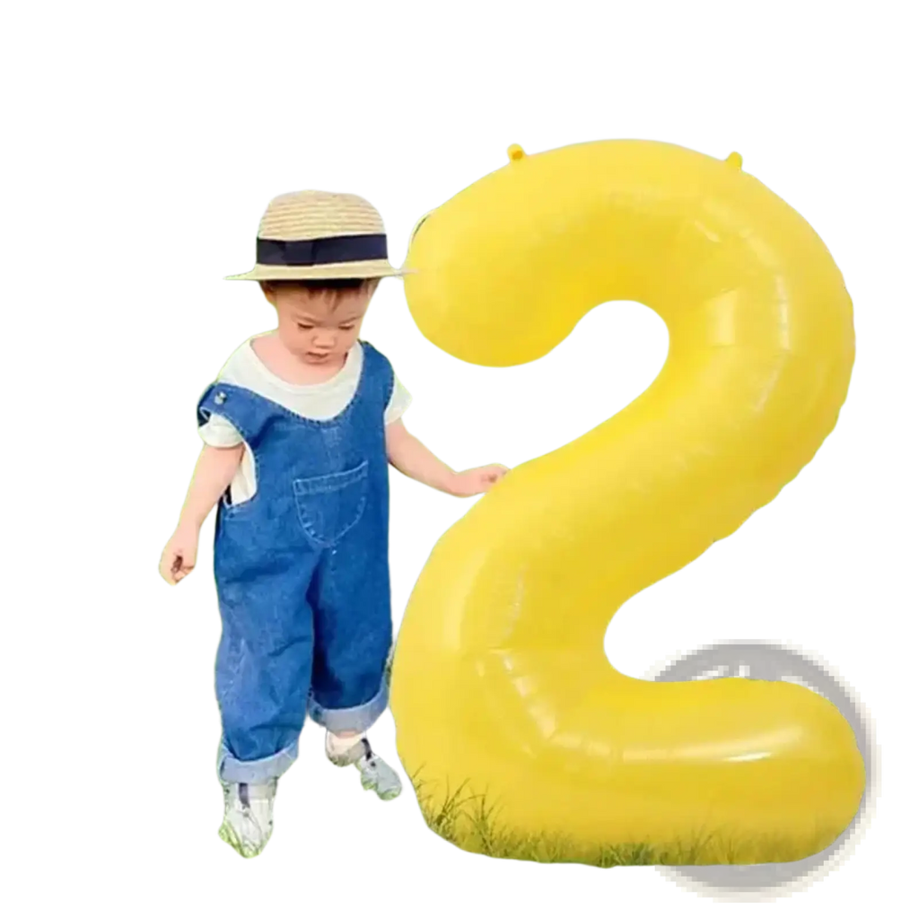 A bright yellow inflatable number two balloon 40 inch made of foil for birthday party decor